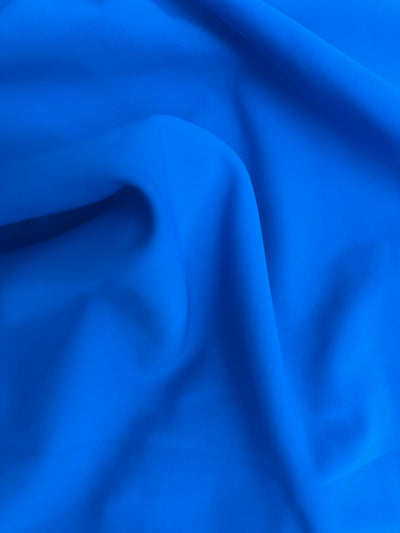LIMITED AVAILABILITY Nationale Royal Blue:  A classic, regal blue that never goes out of style. This versatile shade is perfect for creating polished, sophisticated looks.