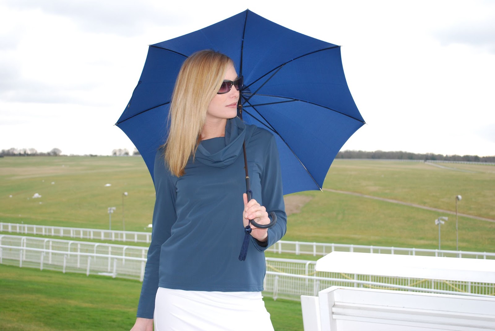 Women holding umbrella